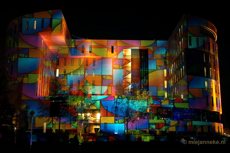 52diversity52.JPG - 52/52 Diversity. During the International Forum of Light in Art and Architecture in Eindhoven with the theme Illusion and Reality, I have taken this picture on the University grounds. The enormous diversity of colors and options that were projected on the buildings, fascinated me enormously. I really enjoyed it and have a lot of pictures as a memory of this cold evening.
